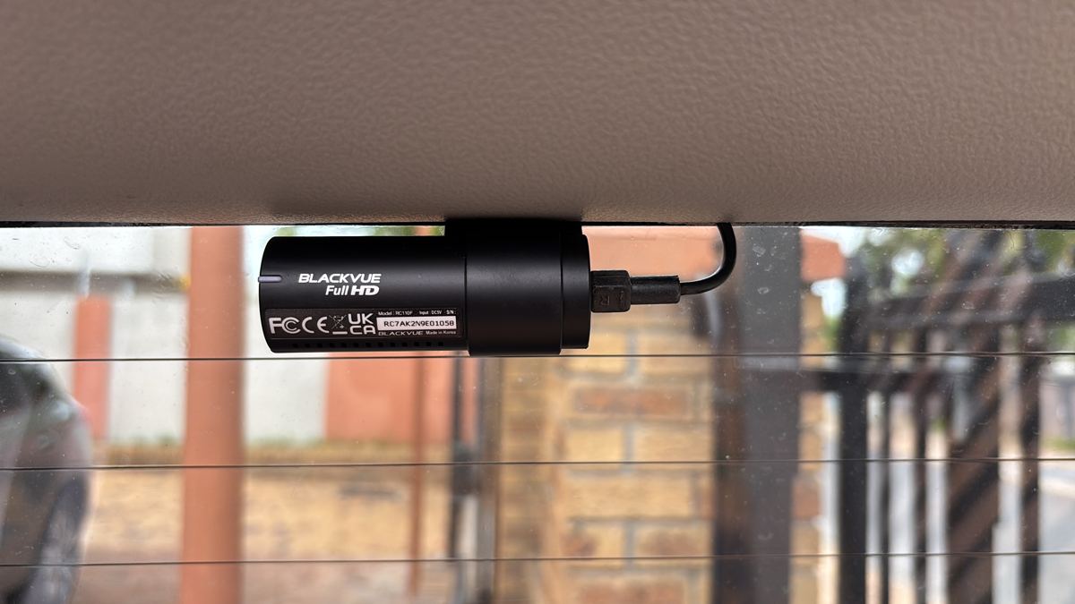 Dashcam power cable routed behind the A-pillar trim