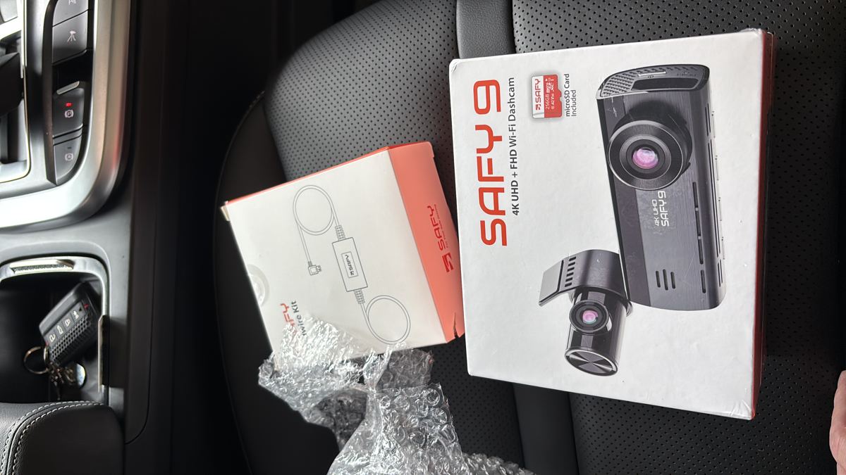 Neatly concealed dashcam wiring along the headlining